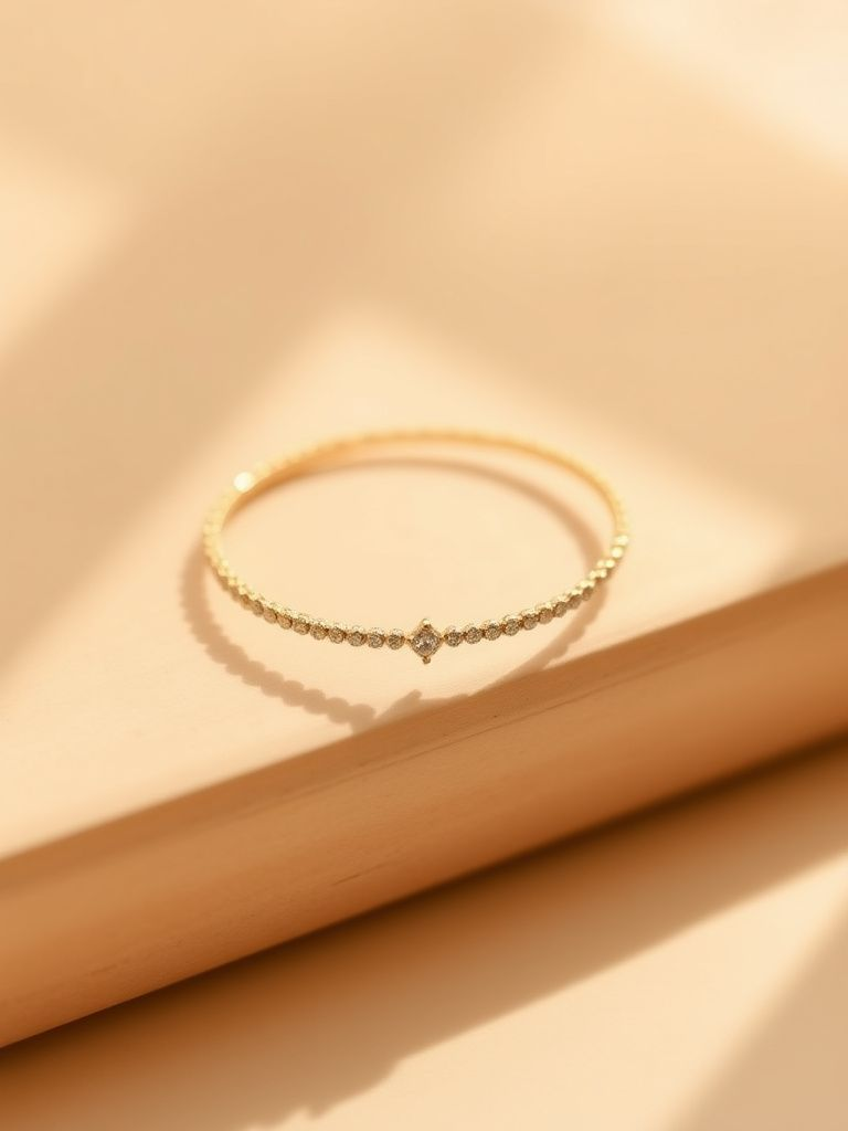 Delicate gold tennis bracelet with small diamonds or CZ stones
